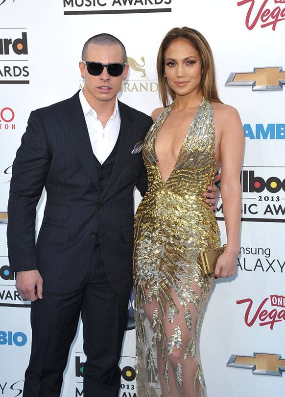 Casper Smart, left, and Jennifer Lopez arrive at the Billboard Music Awards at the MGM Grand Garden Arena in Las Vegas.