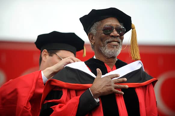 Actor Morgan Freeman receives an honorary degree during the Boston University commencement in Boston.