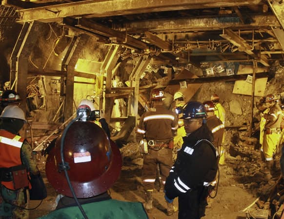 Indonesian unit of Arizona-based Freeport-McMoRan Copper & Gold Inc, rescuers gather inside a tunnel that collapsed on Tuesday morning as they continue the attempt to rescue trapped workers at Big Gossan mining area in Mimika.