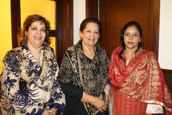 Zohra Shahid, a senior member of former Pakistani cricket star Imran Khan`s Pakistan Tehreek-e-Insaf party in Sindh, poses with unidentified women at an unknown location in Pakistan. Police said gunmen on a motorcycle shot and killed Shahid outside her home, in the city of Karachi.
