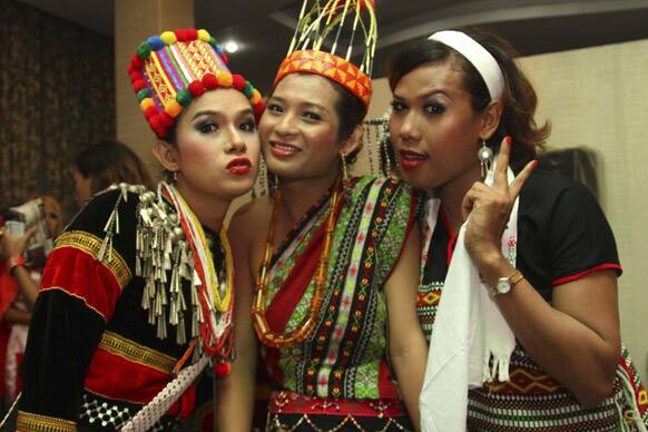 Myanmar gays pose for photos as they take part in a concert during a cerebration of the International Day Against Homophobia and Transphobia in Yangon, Myanmar. Many Myanmar sexual minorities gathered in the event.