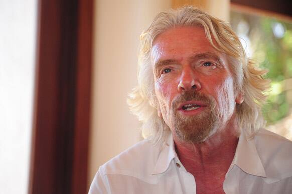 Richard Branson speaks to the press at his property on Necker Island in the British Virgin Islands where he is hosting a meeting with business leaders and politicians regarding an initiative aimed at expanding protection for the Caribbean`s imperiled coasts and waters.