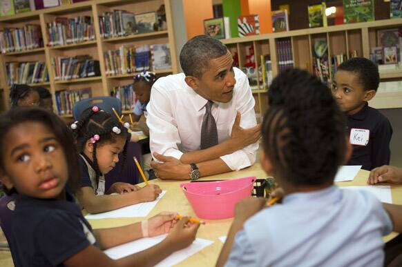 President Barack Obama talks to a class of pre-Kindergarten school children at Moravia Park Elementary School in Baltimore, Md.