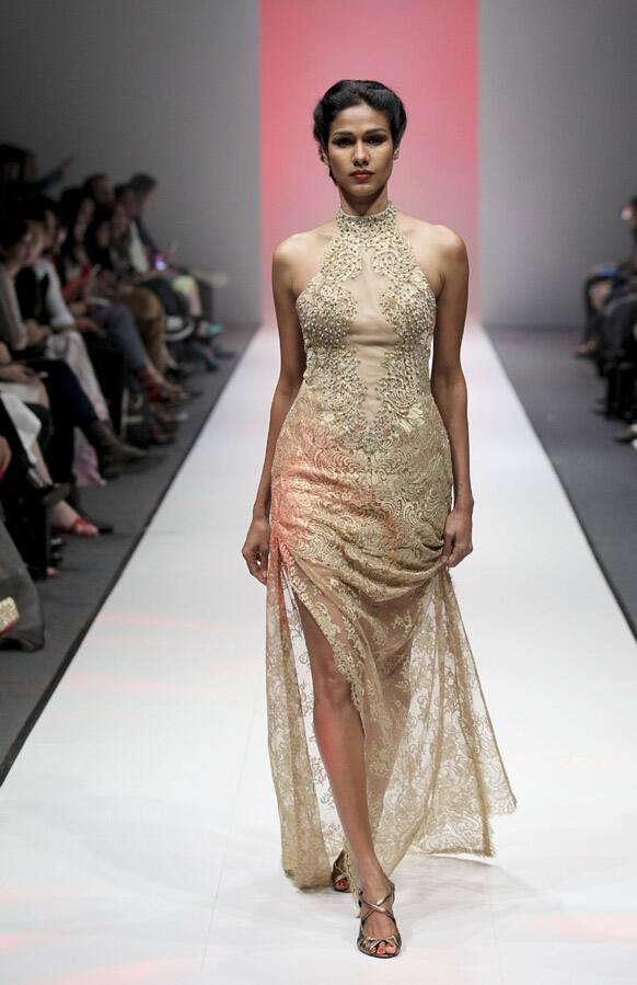 A model displays a creation from the Autumn/Winter 2013 collection by Singapore based designers Zardoze & Panthea during the annual Fashion Festival in Singapore.