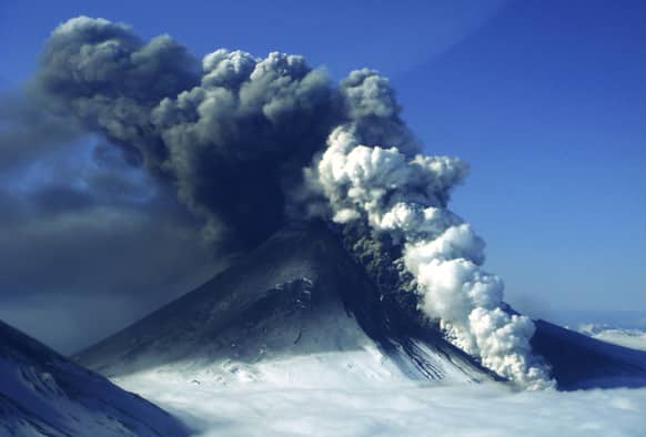 This photo provided by the Alaskan Volcano Observatory, the Pavlof volcano erupts, as seen from the air from the southwest in Cold Bay, Alaska.