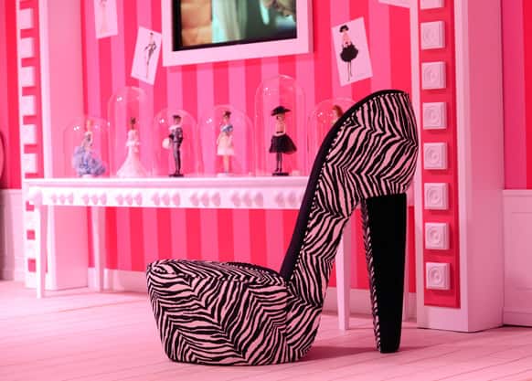 A chair in the shape of a high-heel is is displayed in the Barbie Dreamhouse Experience near Alexanderplatz square in Berlin, Germany. The 2,500 square meter Barbie Dreamhouse Experience will be open for three months in Berlin.