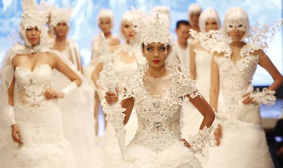 Models present a creation of Indonesian fashion designer Jimmy Fei-Fei during the Jakarta Fashion and Food Festival.