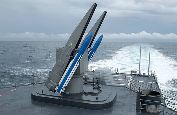 Taiwan`s navy load Standard Type II surface-to-air missiles on the rear of a Kidd-class destroyer during exercises off of the southern city of Kaohsiung,Taiwan.