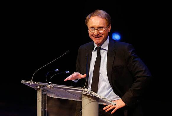 Author Dan Brown speaks during an