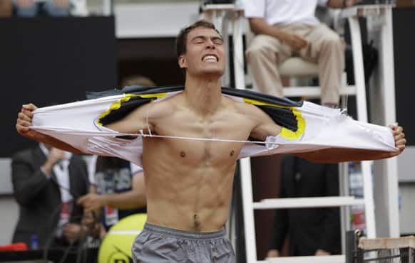Jerzy Janowicz of Poland celebrates afer defeating Jo-Wilfried Tsonga of France rduring their match at the Italian Open tennis tournament in Rome. Janowicz won 6-4, 7-6 (7-5).
