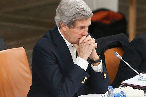 US Secretary of State John Kerry listens during the Arctic Council Ministerial Session at City Hall in Kiruna, Sweden.