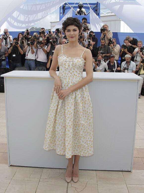 Actress Audrey Tautou, who will host the Cannes Film Festival opening ceremony on Wednesday, poses for photographers at the 66th international film festival, in Cannes.