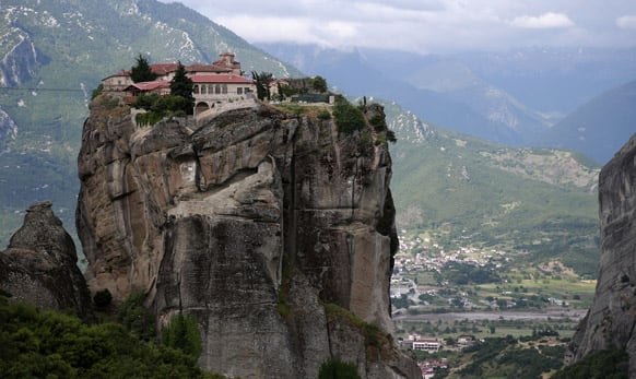 The monastery of Agia Trias is seen at Meteora in northern central Greece. Meteora, a UNESCO World Heritage site, is best known for its cliff top monasteries. some more than 500 years old.
