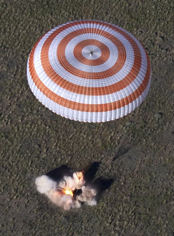 The Russian Soyuz space capsule, carrying US astronaut Thomas Marshburn, Russian cosmonaut Roman Romanenko and Canadian astronaut Chris Hadfield, lands some 150 km (90 miles) southeast of the town of Dzhezkazgan in central Kazakhstan.