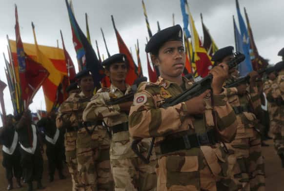 Sri Lankan women soldiers of the civil defense force march during rehearsals for the War Victory Parade in Colombo, Sri Lanka.