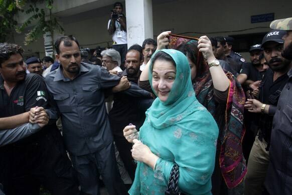 Kalsoom Nawaz, the wife of former prime minister and Pakistan Muslim League-N party chief Nawaz Sharif, walks out of a polling station after casting her ballot in Lahore, Pakistan.