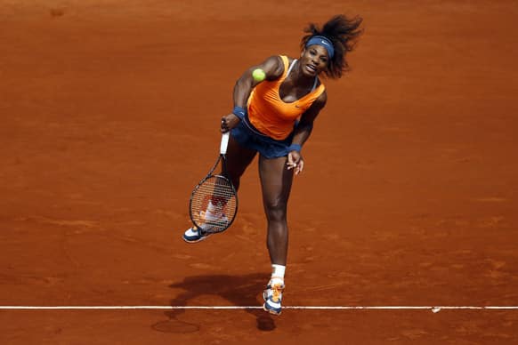 Serena Williams from US serves the ball to Anabel Medina from Spain during the Madrid Open tennis tournament.