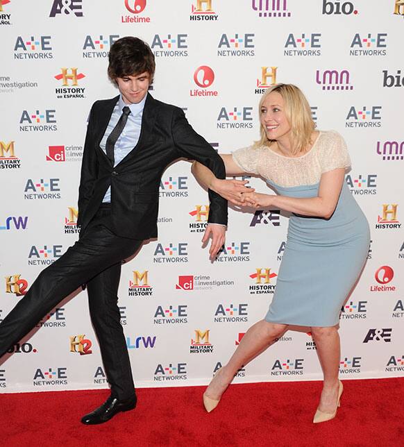 Cast members Freddie Highmore and Vera Farmiga from