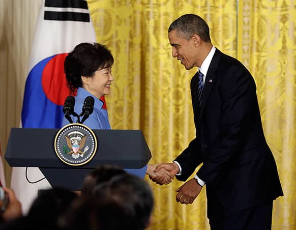 President Barack Obama and South Korea President Park Geun-Hye shake hands at the end of a news conference in the East Room of the White House in Washington.