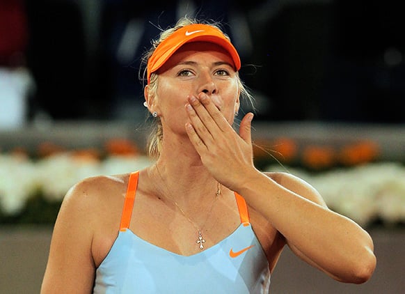 Maria Sharapova from Russia celebrates her victory during a match against Christina McHale from U.S. at the Madrid Open tennis tournament.