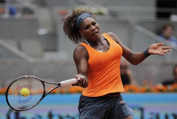 Serena Williams from US returns the ball to Lourdes Dominguez Lino from Spain during the match at the Madrid Open tennis tournament.
