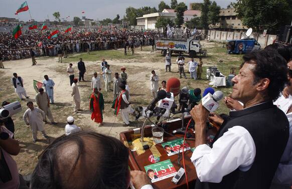 Pakistan`s former cricket star-turned-politician Imran Khan addresses an election campaign rally in Charsadda, Pakistan.