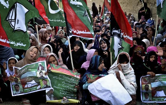 Supporters of Pakistan`s minority Shiite Hazara community, who were frequently attacked by militants, rally for the upcoming elections in Quetta, Pakistan.