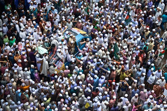 Hefazat-e Islam protesters block one of entry points to the city in Dhaka, Bangladesh. Protesters were demanding that the Bangladesh government enact an anti-blasphemy law, but leaders in the Muslim-majority nation rejected the demand, saying the country is governed by secular liberal laws.