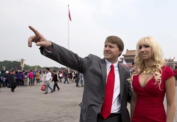 Christopher Cox, grandson of former US President Richard Nixon and his wife Andrea Catsimatidis tour at Tiananmen Square in Beijing. A delegation led by Cox and former US officials are here to commemorate the late US President`s centennial by retracing the 1972 historical visit to China.