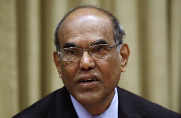 Reserve Bank of India (RBI) governor D. Subbarao attends a monetary policy review meeting in Mumbai. India`s central bank cut a key interest rate by a quarter percentage point to 7.25 percent on Friday.