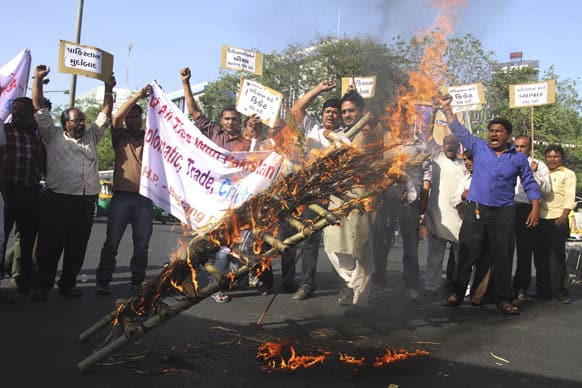 Activists of right wing Hindu groups burn an effigy representing Pakistan after Sarabjit Singh, who was on Pakistan`s death row, died from a head injury after two inmates attacked him with a brick in a Lahore jail, during a protest in Ahmadabad.