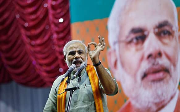 India`s main opposition Hindu nationalist Bharatiya Janata Party (BJP) leader Narendra Modi speaks during a campaign rally for the upcoming state elections in Bangalore.