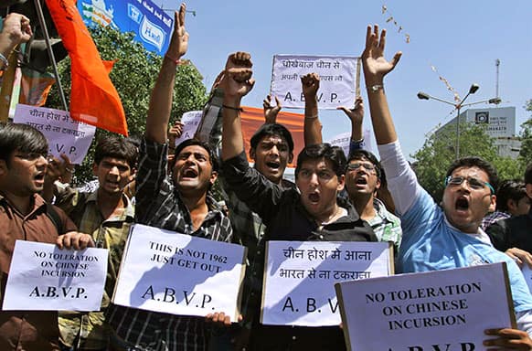 Indian supporters of Akhil Bharatiya Vidhyarthi Parishad (ABVP) or All India Student Council hold placards and shouts slogans against the alleged incursion by Chinese troops into Indian territory, during a protest in Ahmadabad.