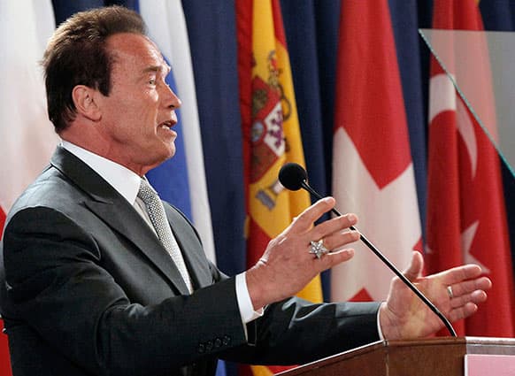 Former California Gov. Arnold Schwarzenegger speaks at a news conference on immigration reform at the University of Southern California in Los Angeles.