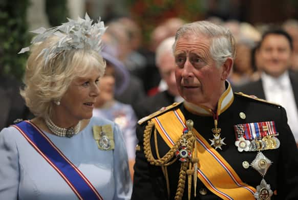 Britain`s Prince Charles and his wife Camila, Duchess of Cornwall take their seats at the Nieuwe Kerk or New Church in Amsterdam.