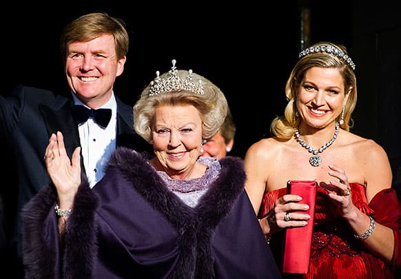 Dutch Queen Beatrix, center, and Dutch Crown Prince Willem-Alexander, left, and his wife Princess Maxima arrive for a banquet hosted by the Dutch Royal family at the Rijksmuseum, Amsterdam, The Netherlands.