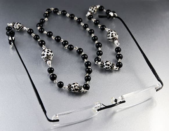 This publicity product photo provided by Lori Bergmann shows a vintage glass chain Leopard Lanyard by Lori Bergmann (LoriBergmann.etsy.com), with handmade lampwork Leopard glass beads, that uses simple wire wrapping techniques.