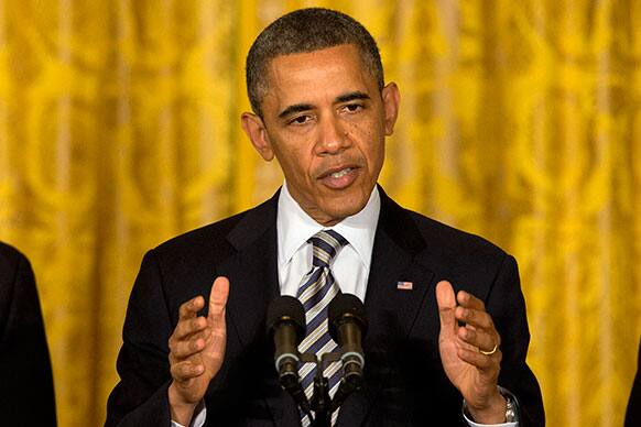 President Barack Obama gestures as he announces he will nominate Charlotte, N.C. Mayor Anthony Foxx to succeed Ray LaHood as Transportation Secretary, in the East Room of the White House in Washington.
