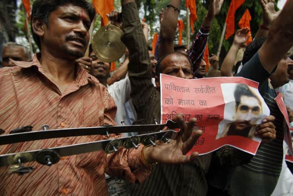 Activists of right-winged Shiv Sena shout slogans against the Pakistan government during a protest against an attack on an Indian prisoner in a Lahore prison, in Jammu.