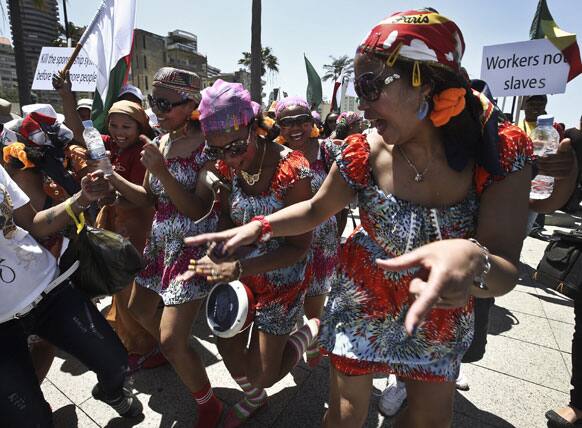 Migrant domestic workers, dance during a march demanding basic labor rights as Lebanese workers, at Beirut`s seaside, Lebanon.