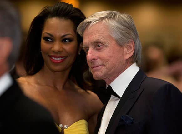 Michael Douglas poses for a photo during the White House Correspondents` Association Dinner at the Washington Hilton Hotel, in Washington.