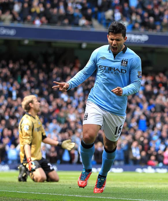 Manchester City`s Sergio Aguero celebrates after scoring his team`s opening goal during their English Premier League soccer match at the Etihad Stadium, Manchester, England.