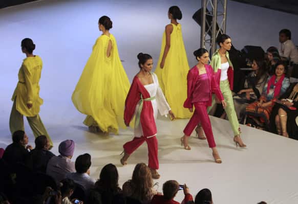 Pakistani models show creations of a brand `Sublime by Sara` during Lahore Fashion Week in Pakistan.