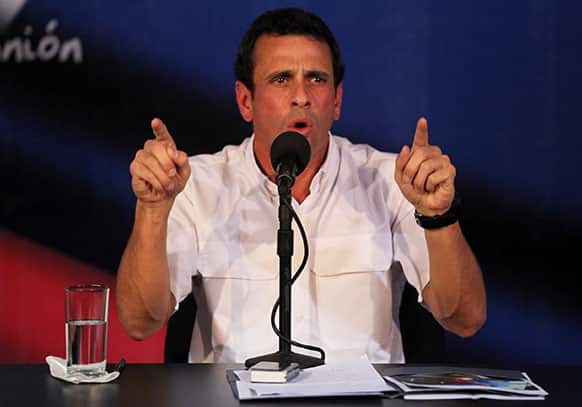 Venezuela`s opposition leader Henrique Capriles speaks at a news conference at his office in Caracas, Venezuela.