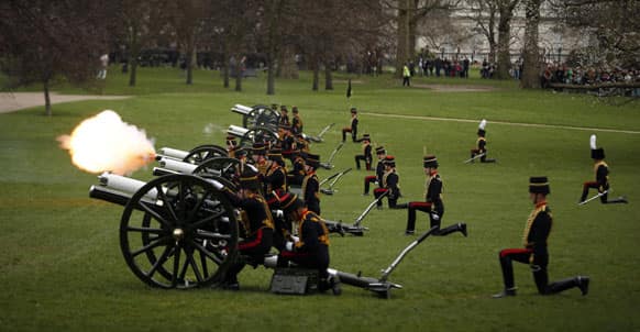 Members of the British military`s Kings Troop Royal Horse Artillery fire during a 41-gun royal salute to mark the 87th birthday of Britain`s Queen Elizabeth II in Green Park, London.