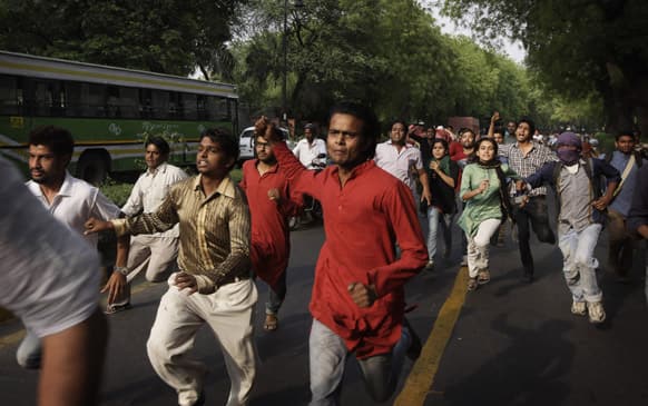 Protestors shouting slogans rush towards the Prime Minister`s residence during a protest against the rape of a 5-year-old girl in New Delhi.