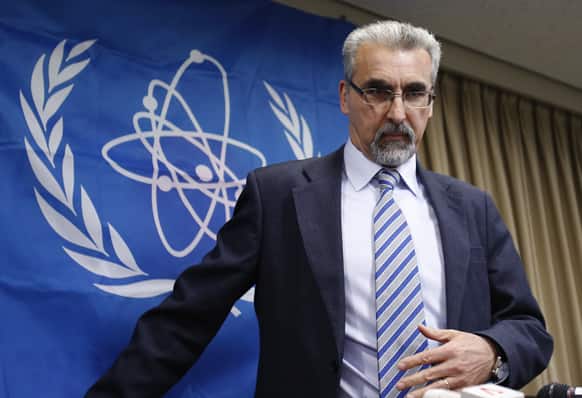 International Atomic Energy Agency mission team leader Juan Carlos Lentijo arrives at a press conference in Tokyo.