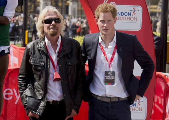 Britain`s Prince Harry and Sir Richard Branson, pose during this year`s Virgin London Marathon, in central London.