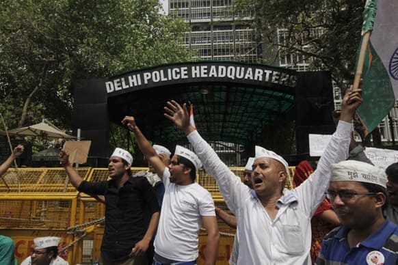 Protestors shout slogans outside the Delhi Police Headquarters during a protest against the rape of a 5-year-old girl in New Delhi.