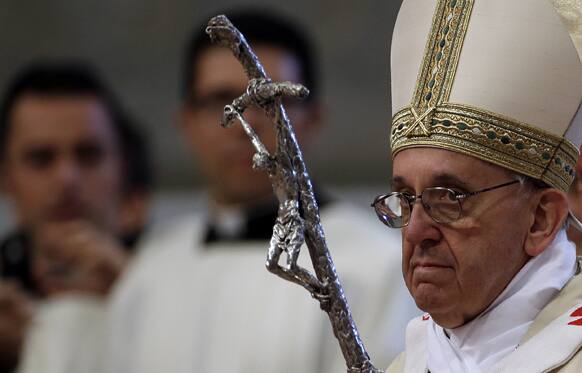 Pope Francis arrives to celebrate a mass where he will ordain ten new priests in St. Peter`s Basilica at the Vatican.